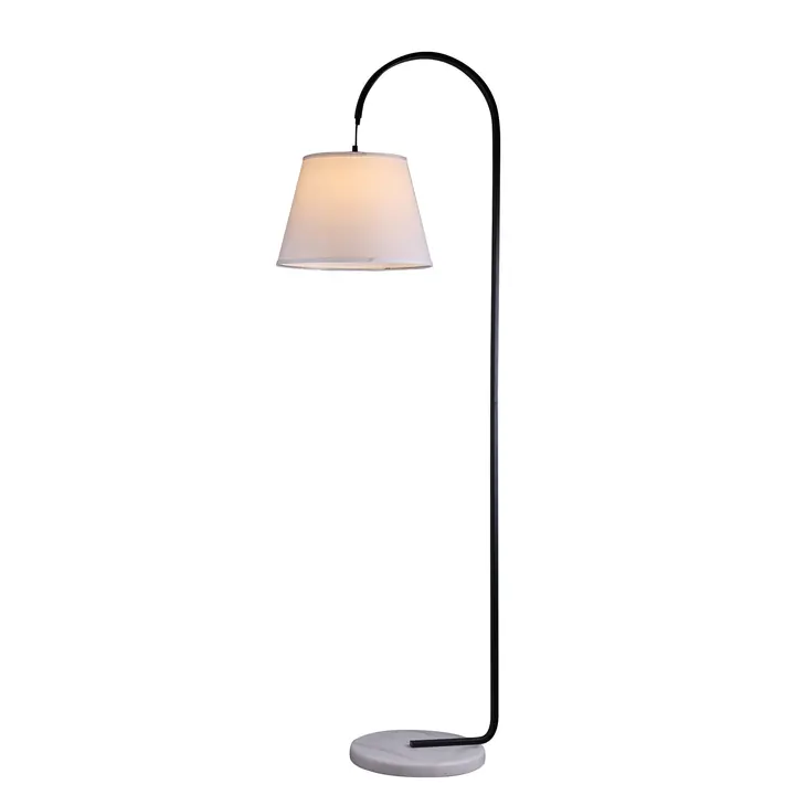 A white Thea floor lamp with a drum shade